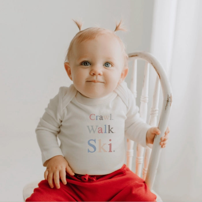Baby Long-Sleeve Onesie: Crawl - Walk - Ski